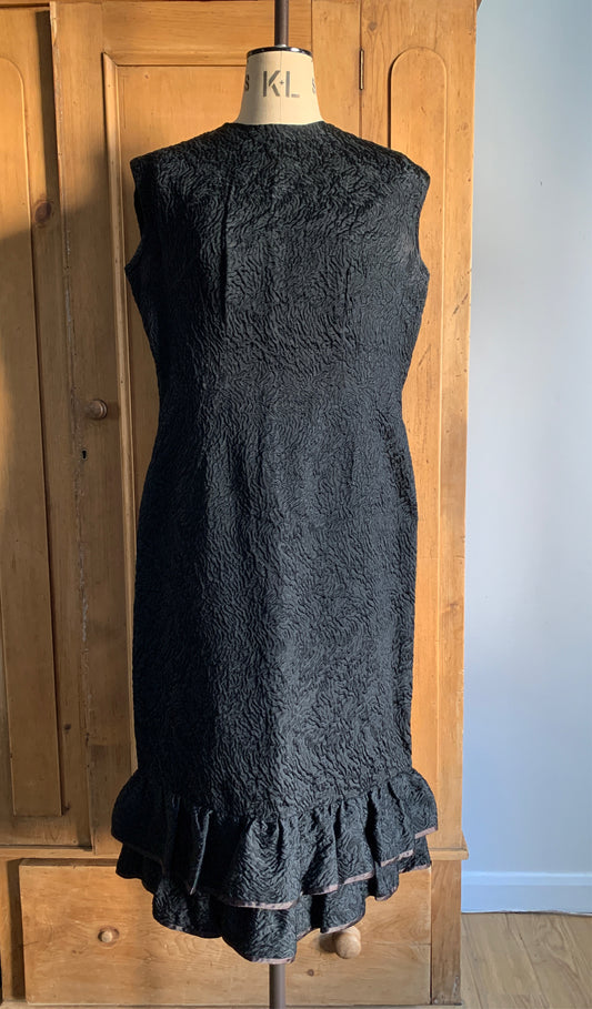 1 Party Time Pals Collection: 1960’s Black Astrakan Style Wiggle Dress with Ruffle Hem